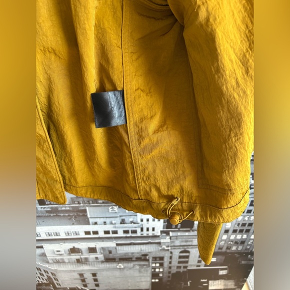 Lululemon Water-Repellent Mesh Jacket in Gold Spice / Black - Picture 10 of 15